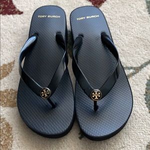 Tory Burch black cutout wedge flip flops